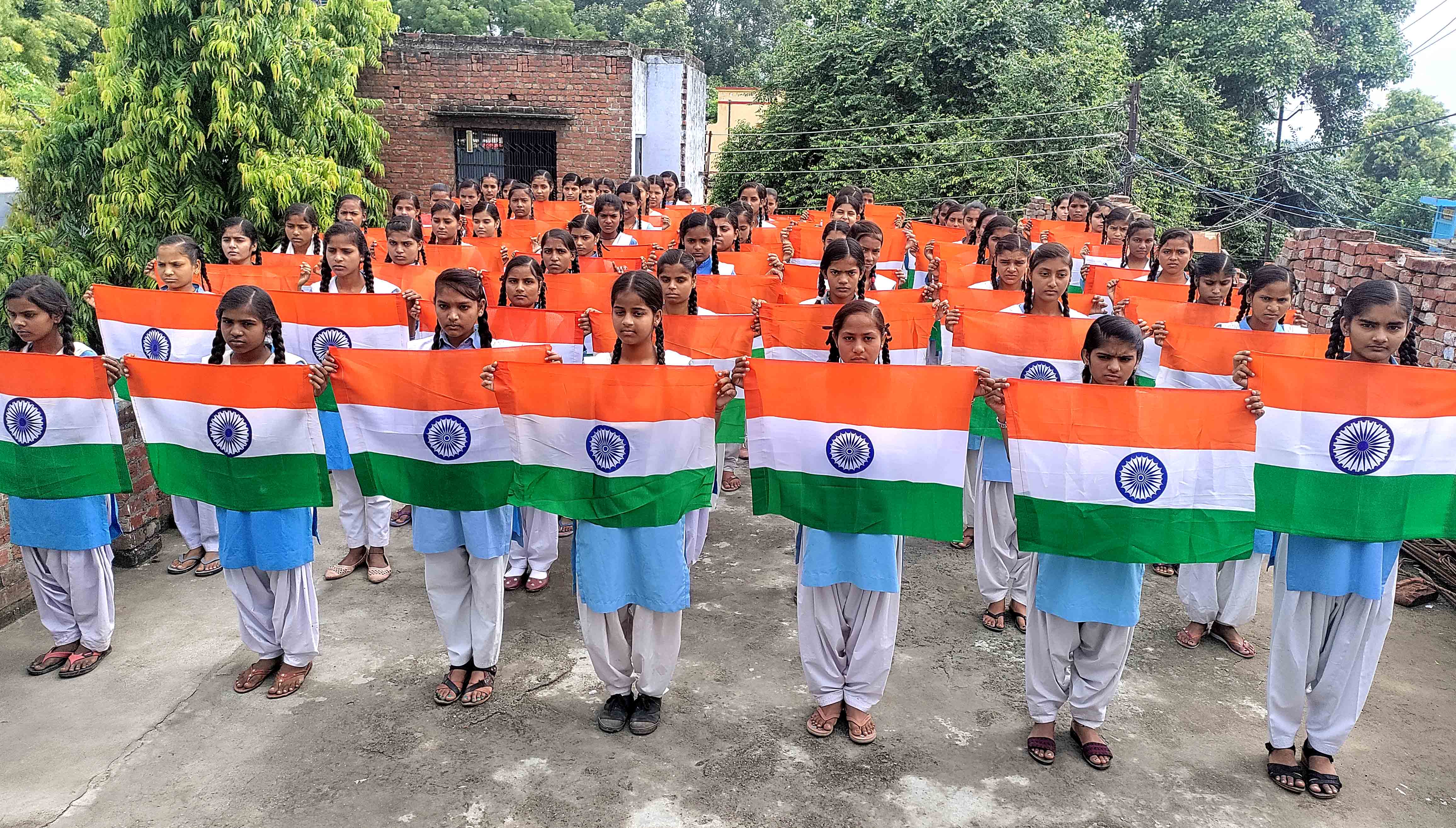 Students with tricolor flags